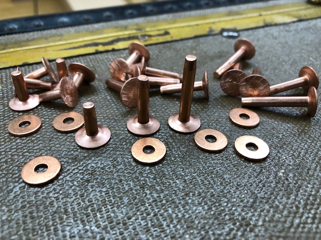 9 copper rivets and burrs sold by the pound