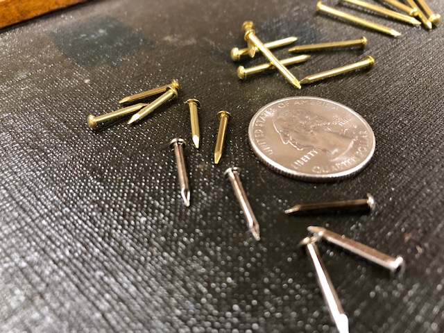 brass or nickel escutcheon pins