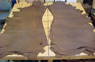 Brown leather hides for making quivers