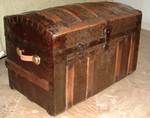 Refinished antique metal clad trunk