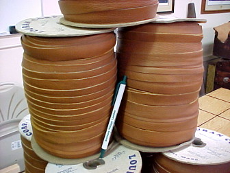 Spools of leather stripping