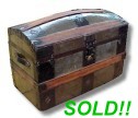 Metal dome top antique trunk for sale