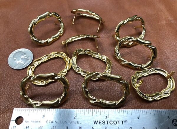 Brass decorations for leather