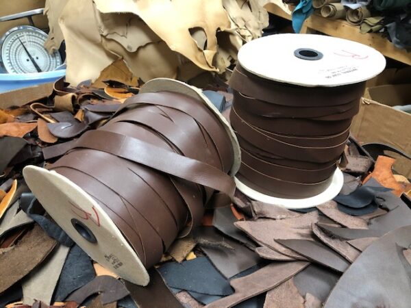 brown one inch wide leather ribbon on spools