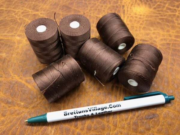 dark brown dacron thread on small spools