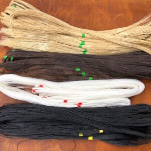 hand sewing threads in four colors