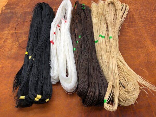 four colors of waxed poly hand stitching thread