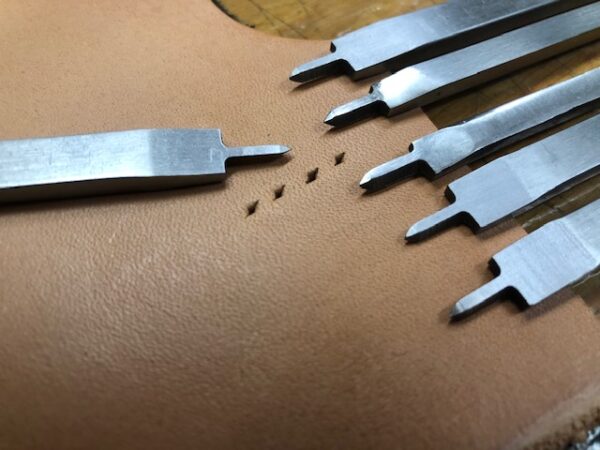 Thonging chisels or pricing irons make evenly spaced holes
