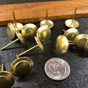 Brass buttons for trunk repair
