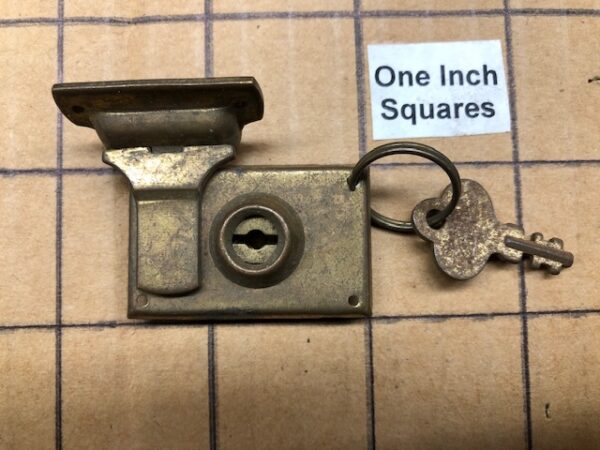 Very small vintage case lock with key
