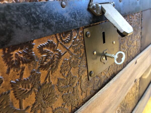 T1977 Mid-Sized Floral Embossed Metal-Covered trunk from the 1880s